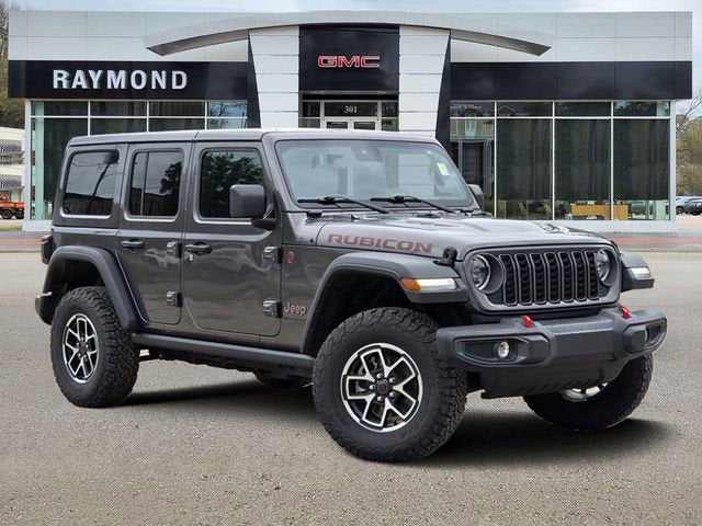 2025 Jeep Wrangler Rubicon in Gray — front three-quarter view