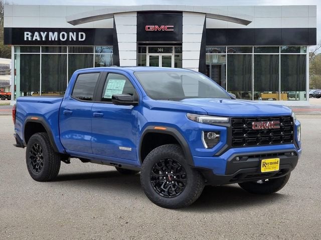 2026 GMC Canyon Elevation in Rapids Metallic — front three-quarter view