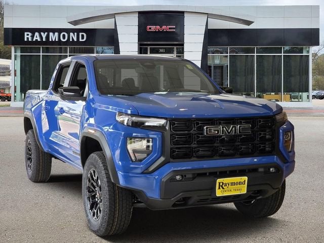 2026 GMC Canyon Elevation in Rapids Metallic — front three-quarter view