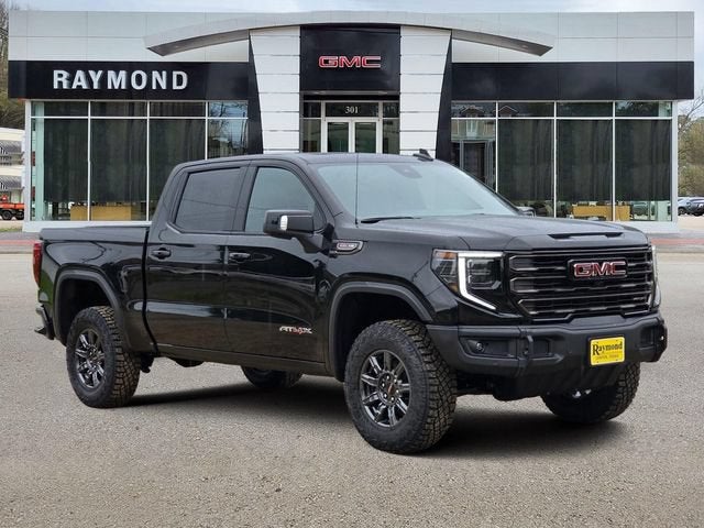 2026 GMC Sierra 1500 AT4X in Onyx Black — front three-quarter view